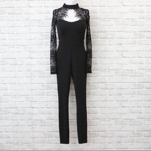 Material Girl. Women Illusion Long Sleeve Halter Jumpsuit Size S, used once.
